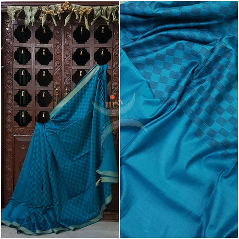 Turquoise blue  half and half Bengal Handloom cotton with woven checks and plain with striped pallu. Saree comes with plain blouse . 