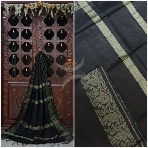 Black handloom cotton saree with traditional paisley woven border and striped pallu.