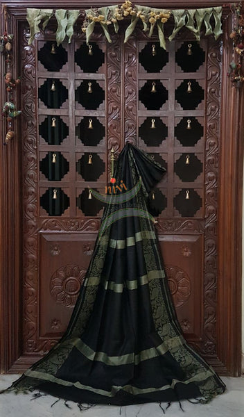 Black handloom cotton saree with traditional paisley woven border and striped pallu.
