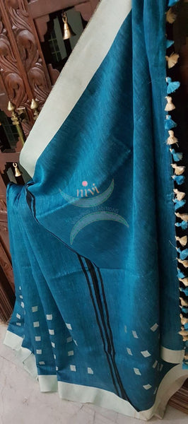 Teal Handloom 100s count Linen saree with woven booties and contrasting cream border and striped pallu.