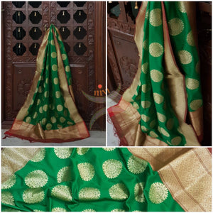 Green with red benarsi brocade duppata with woven zari booties all over.