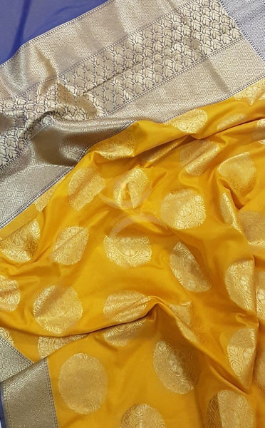 Yellow with blue benarsi brocade duppata with woven zari booties all over.
