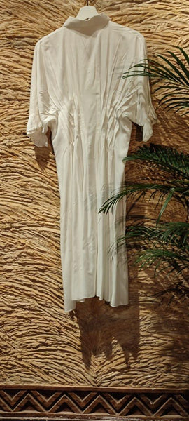 Long white shirt. Length 42”. Size L.